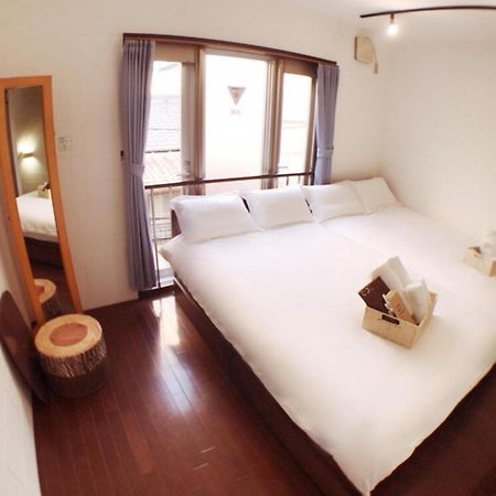 Osaka Sinsei Guest House Экстерьер фото